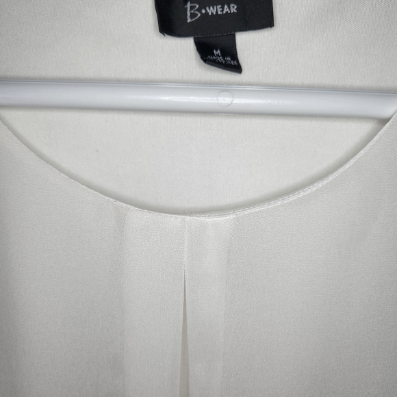 Flowing White Top with flare sleeves and a mid rise waist - Picture 3 of 5